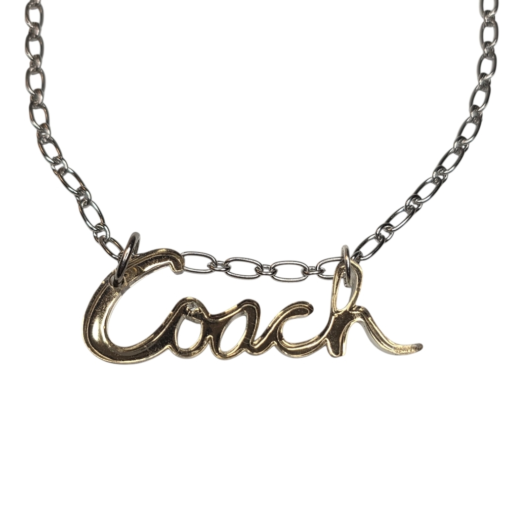 Gold Acrylic Coach Poppy Charm On Silver Chain Link Necklace